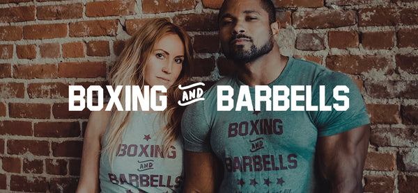 Man and woman posing in Boxing and Barbells t-shirts