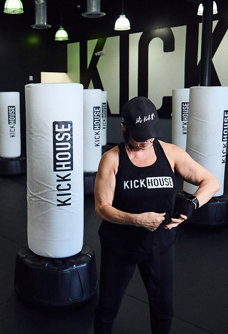 woman wrapping hand for boxing training