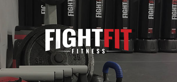 FightFit logo overlay on photo of a gym
