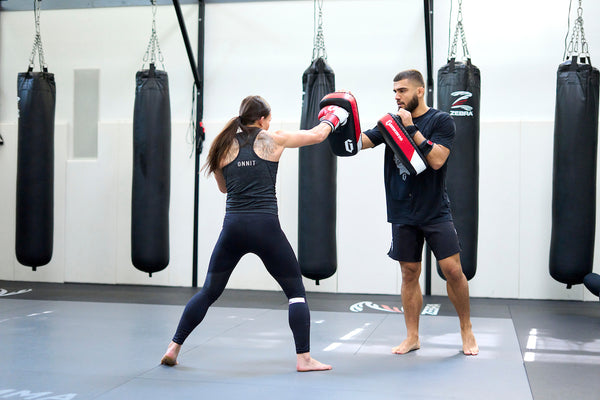 Man and woman training in gym