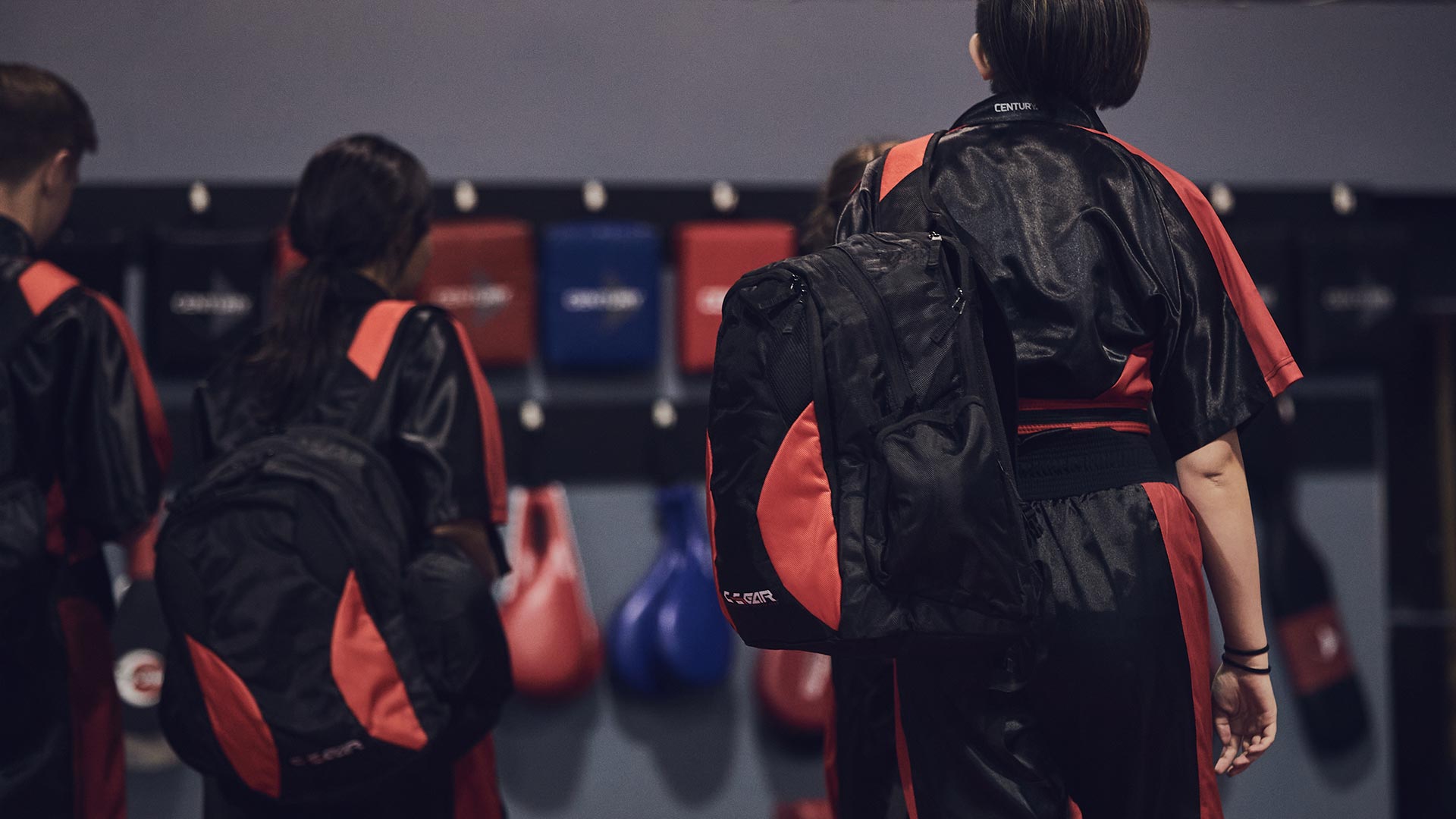 students wearing c-gear backpacks and century uniforms