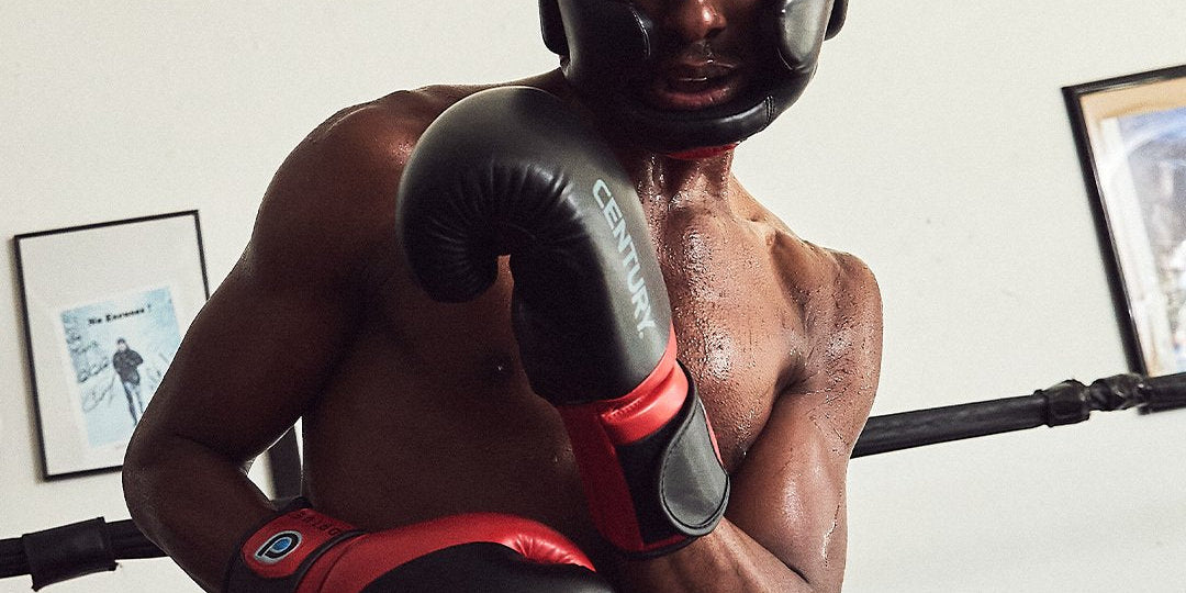 Man wearing gloves and headgear 