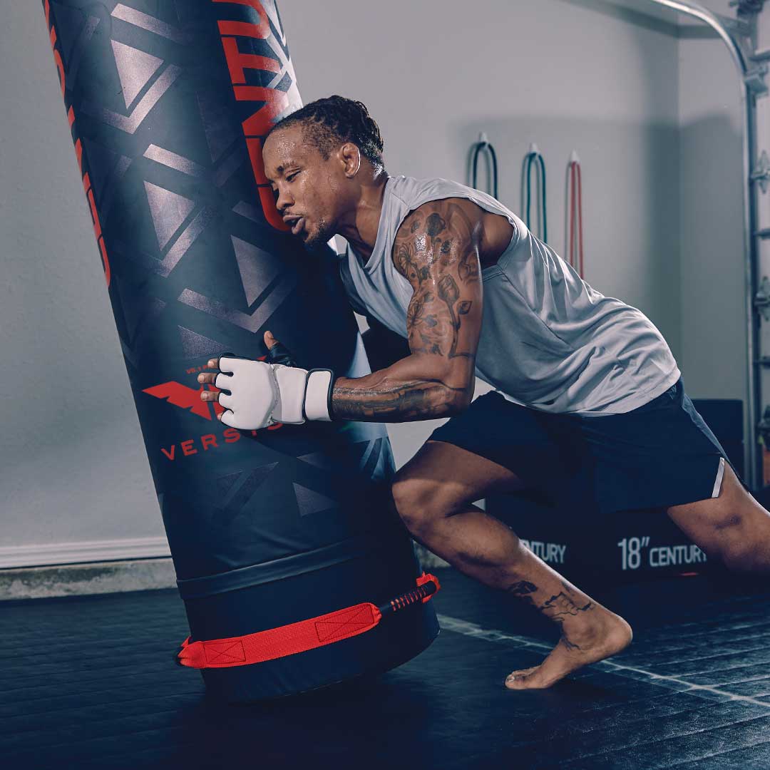 man in gym working out wiht versys bag