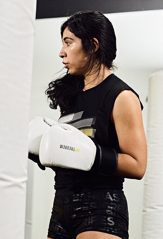Woman with custom boxing gloves