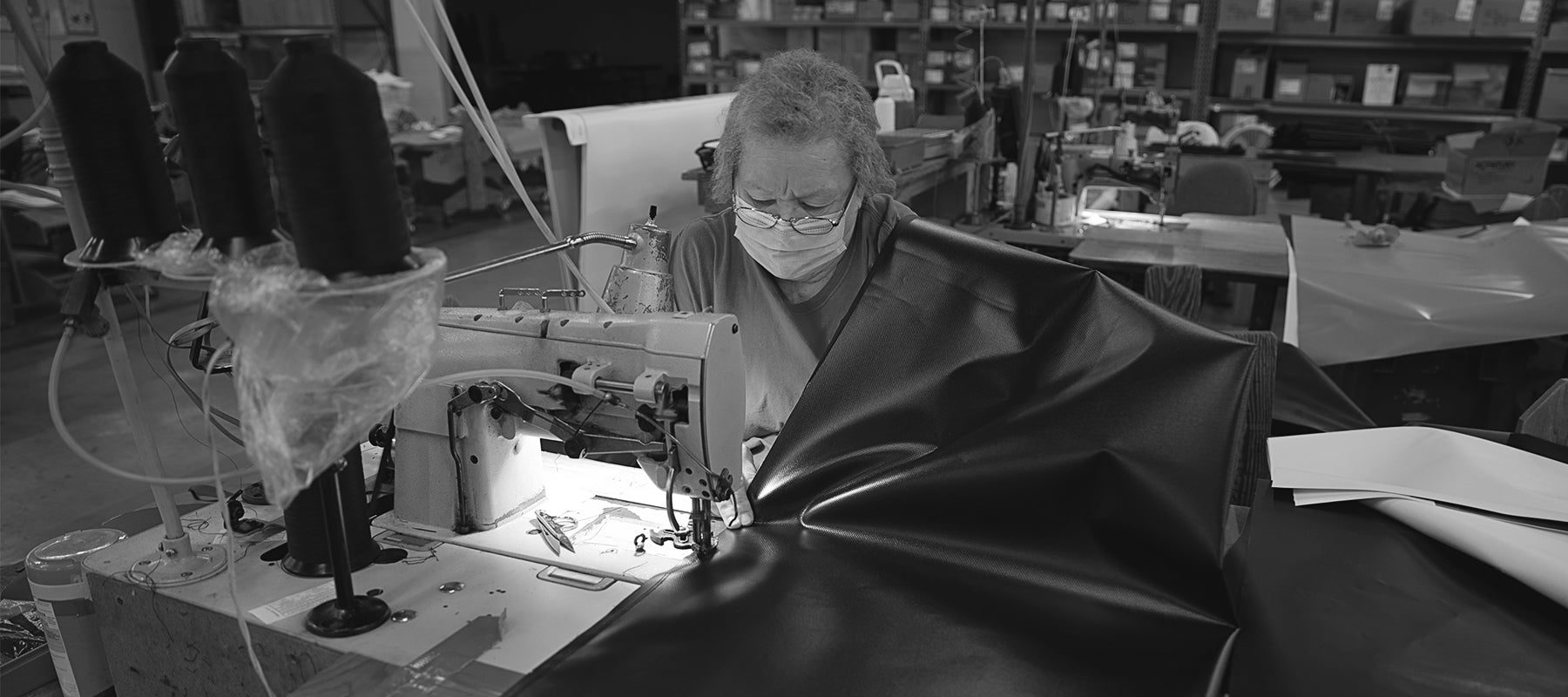 Century worker sewing bags