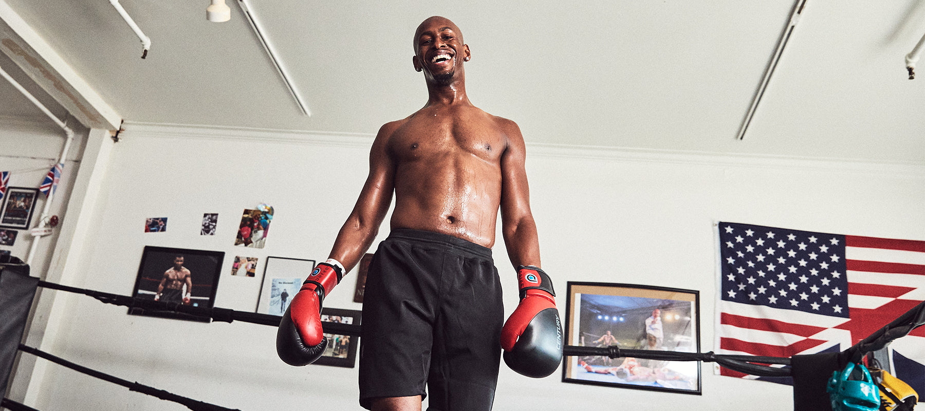 Man in boxing ring wearing gloves