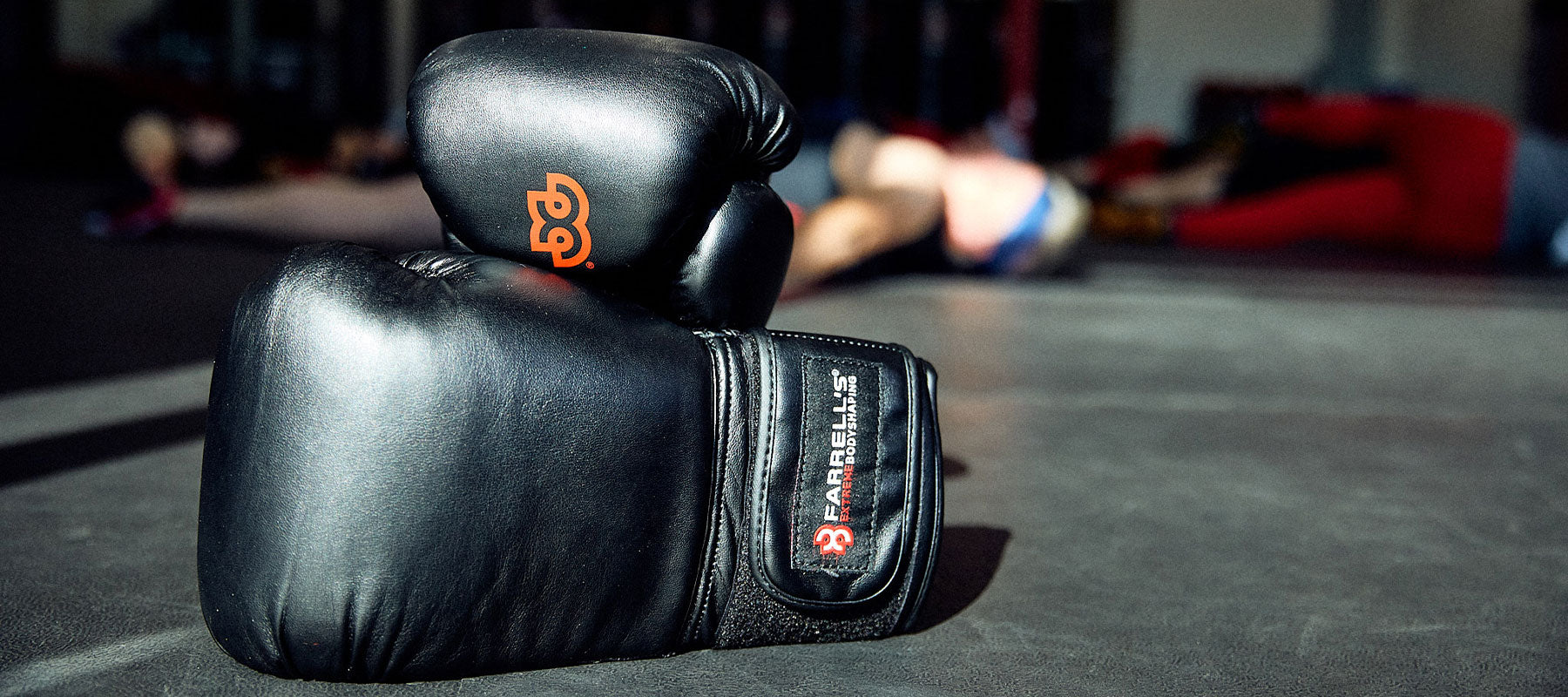 boxing gloves sitting on the ground